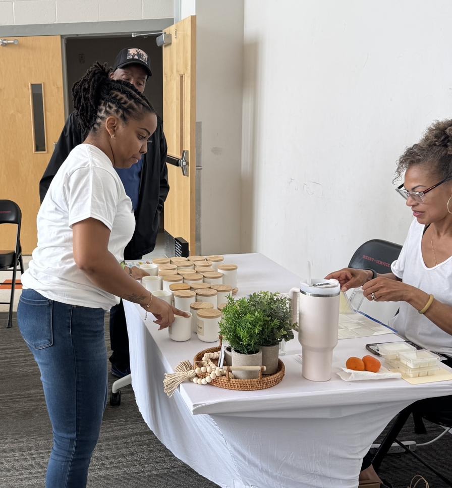 Customer browsing Sol Refuge candles